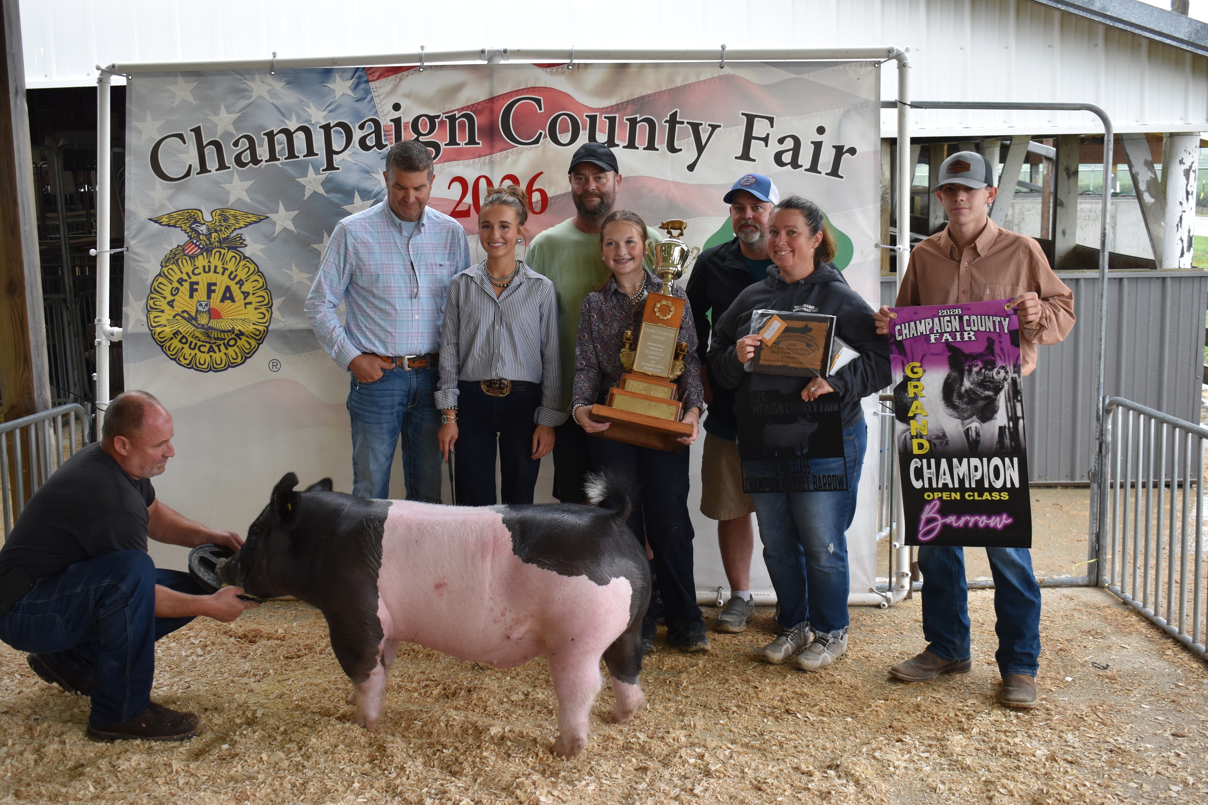 Youth participant showing pig